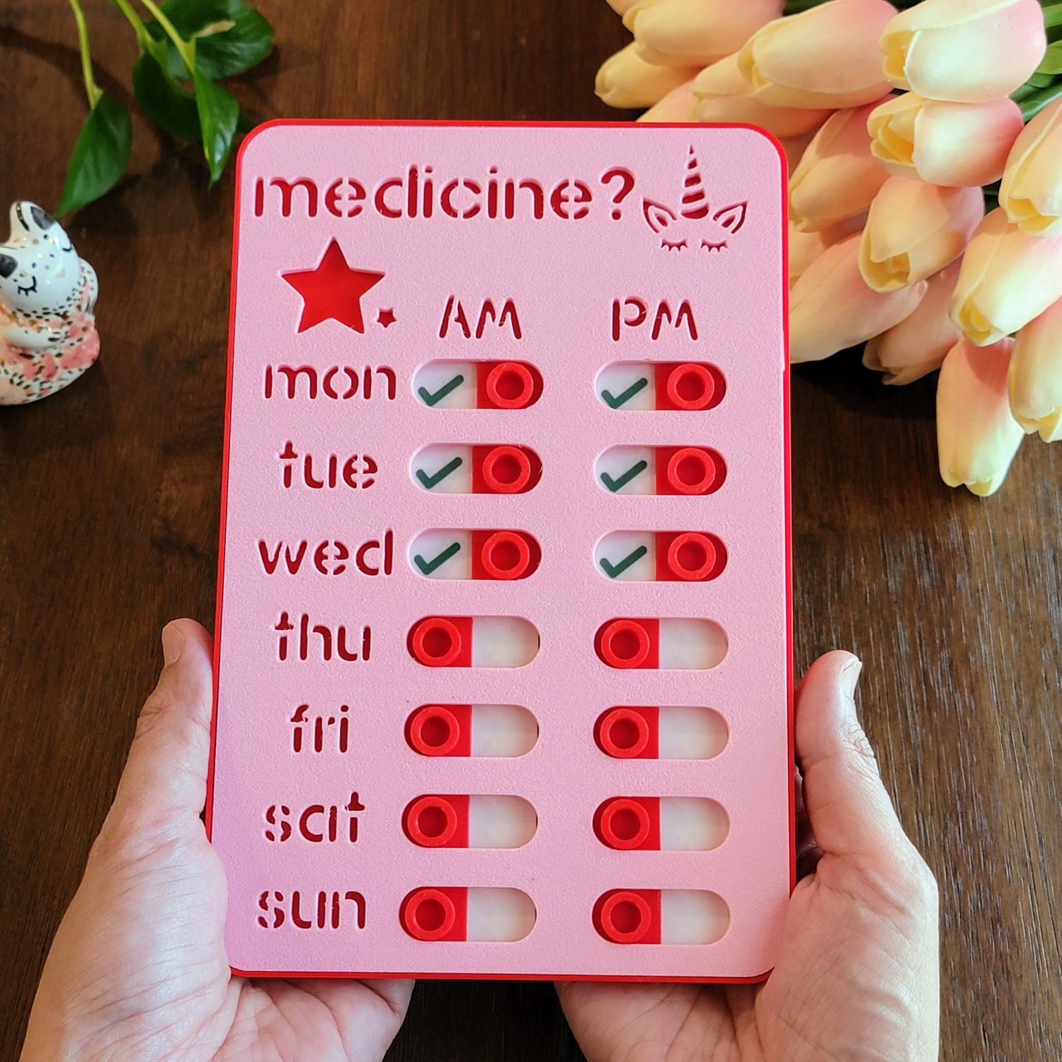 pink medicine with hands square